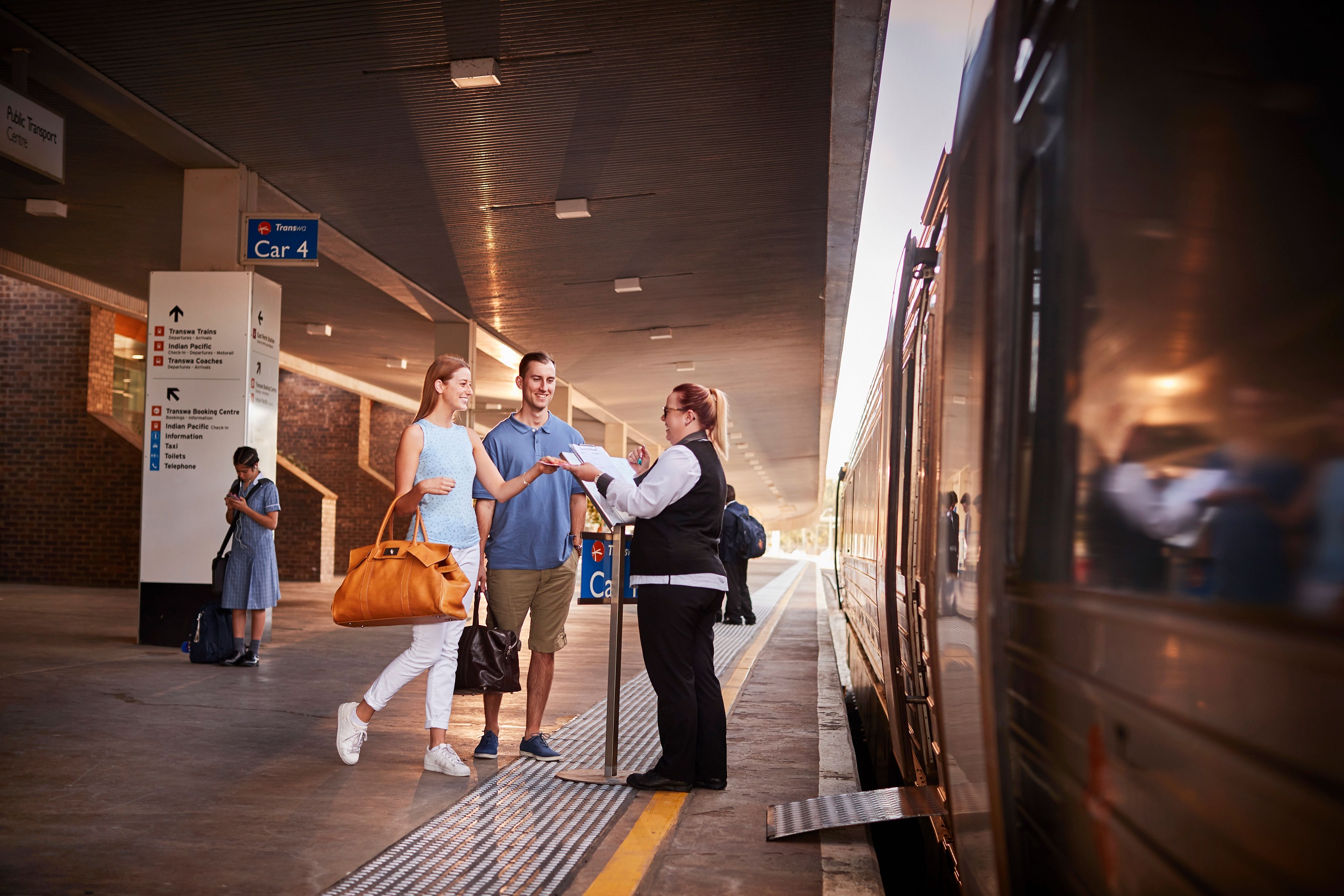 Couple boarding train